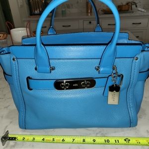 Beautiful turquoise coach bag